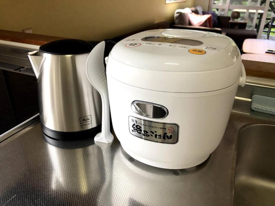 恩納村名嘉真フォレストヴィラ12時チェックアウト可ダブルベッド2台と2段ベッドとユニットバス2室 Buitenkant foto